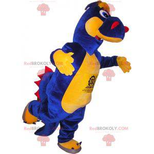 Mascote de dinossauro tricolor. Mascote dragão - Redbrokoly.com