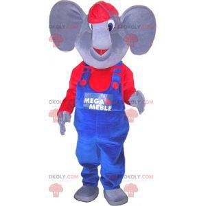 Mascota elefante gris y rojo vestida con un mono -