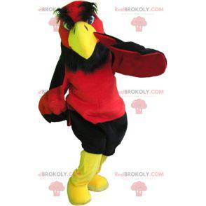 Maskot červený černý a žlutý pták sup. Obří orel -
