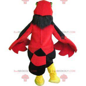 Red black and yellow bird vulture mascot. Giant eagle -