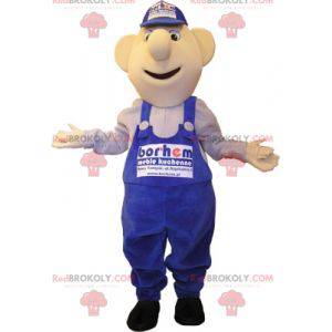 Schneemann Maskottchen in blauen Overalls gekleidet. Mechaniker