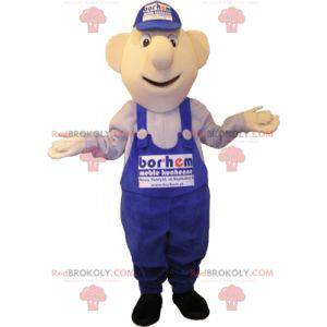 Schneemann Maskottchen in blauen Overalls gekleidet. Mechaniker