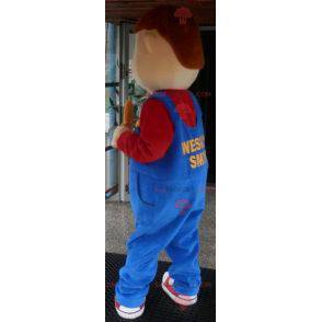 Menino mascote sorridente vestido de macacão - Redbrokoly.com