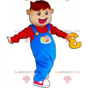 Menino mascote sorridente vestido de macacão - Redbrokoly.com