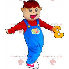 Menino mascote sorridente vestido de macacão - Redbrokoly.com