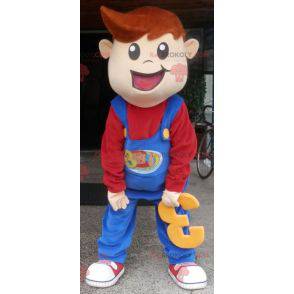 Menino mascote sorridente vestido de macacão - Redbrokoly.com