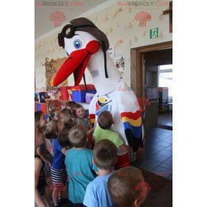 White stork mascot with colorful wings - Redbrokoly.com