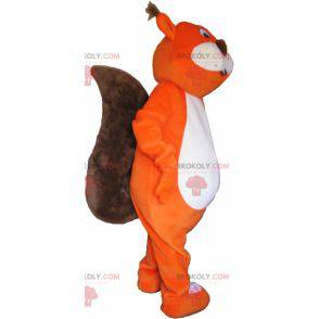 Mascot gigantische oranje vos met een grote staart -