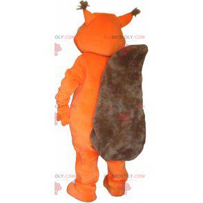 Mascotte de renard géant orange avec une grosse queue -