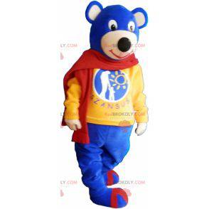 Mascotte orso blu che indossa una sciarpa rossa - Redbrokoly.com