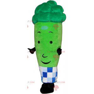 Giant green asparagus mascot surrounded by a checkered paper -