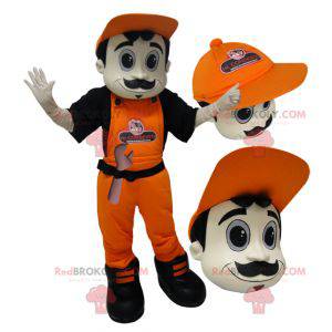 Mascotte d'homme en salopette et casquette orange. -