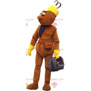 Mascotte de bonhomme marron tout fin avec un sac -