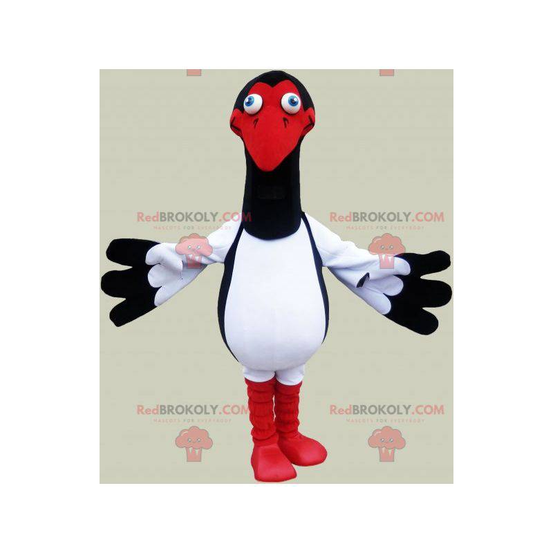 Mascotte de mouette blanche noire et rouge. Costume d'oiseau -