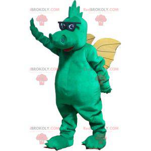 Mascotte de dragon vert avec des ailes jaunes et des lunettes -