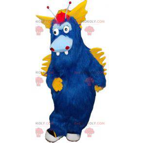 Mascotte de gros monstre bleu et jaune tout poilu -