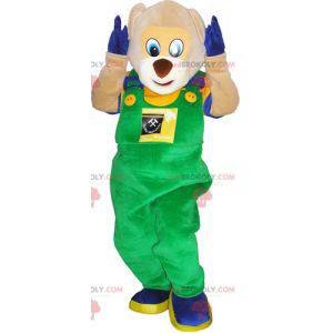 Teddy bear mascot in overalls and colorful outfit -