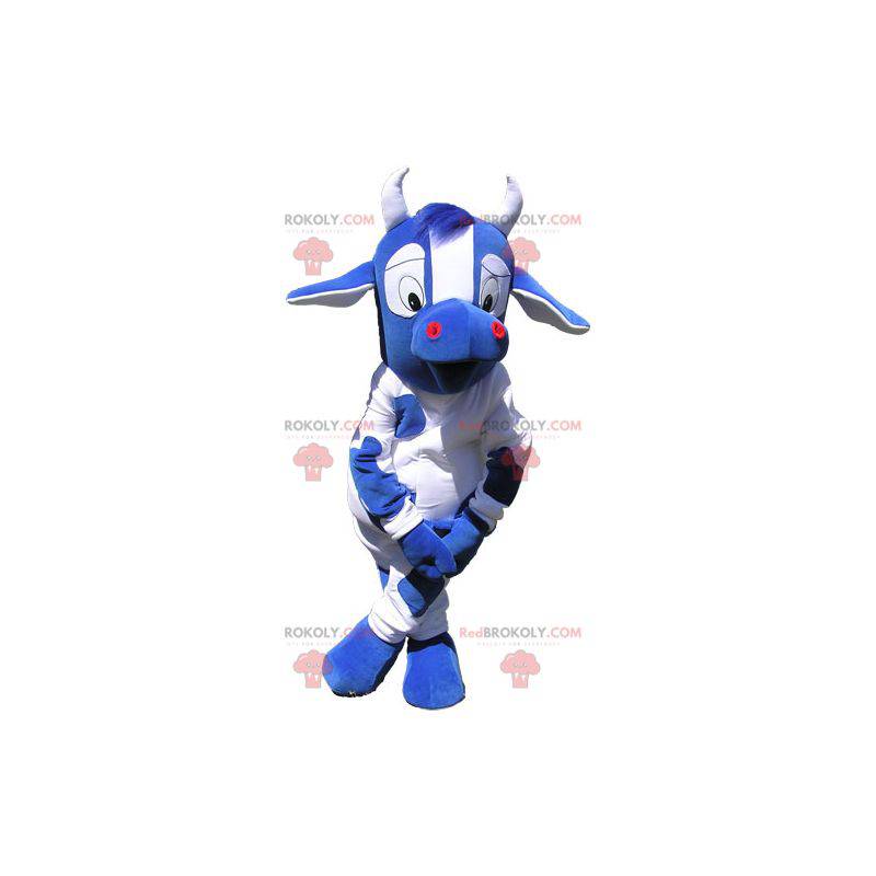 Mascota de la vaca azul y blanca con ojos grandes -