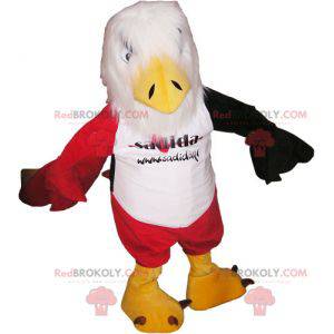 Mascote vermelho e águia branca preta com calção vermelho -