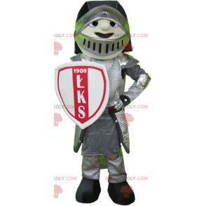 Knight mascot in armor with helmet and shield - Redbrokoly.com