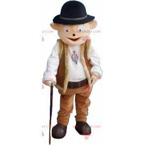 Snowman mascot in shepherd outfit with bowler hat -