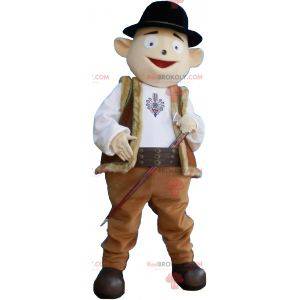 Mascotte de bonhomme en tenue de berger avec chapeau melon -