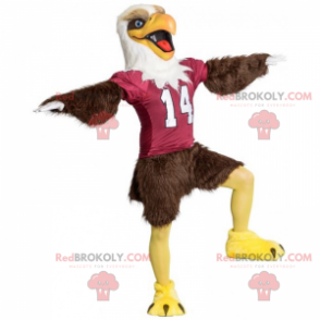 Mascotte aigle marron avec maillot de football américain -