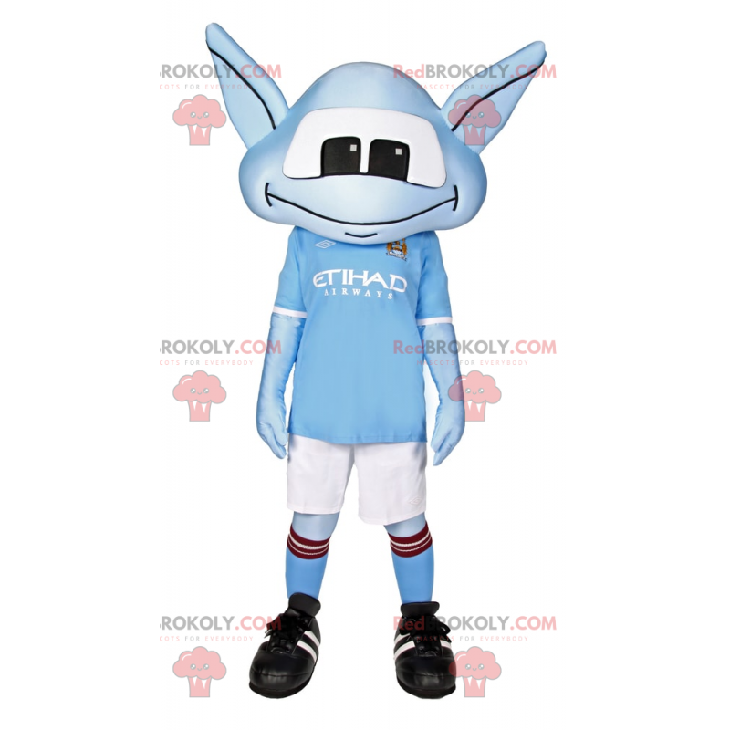 Modrý mimozemský maskot s dlouhými ušima a fotbalovým oblečením