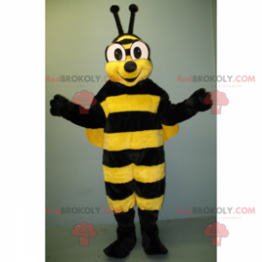 Mascota de abeja con ojos grandes y sonriendo - Redbrokoly.com