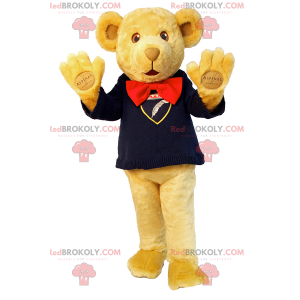 Adorable teddy bear mascot with sweater and bow tie -