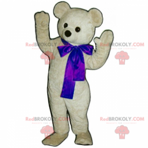 Entzückendes weißes Teddybärmaskottchen mit seiner blauen