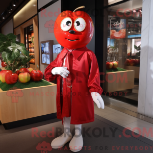 Röd eplemaskotkostyme kledd...
