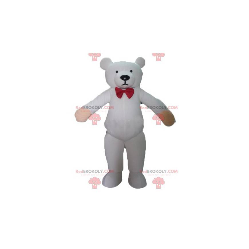 Mascotte de nounours blanc avec un nœud de papillon rouge -