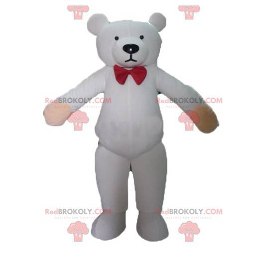 Mascotte de nounours blanc avec un nœud de papillon rouge -