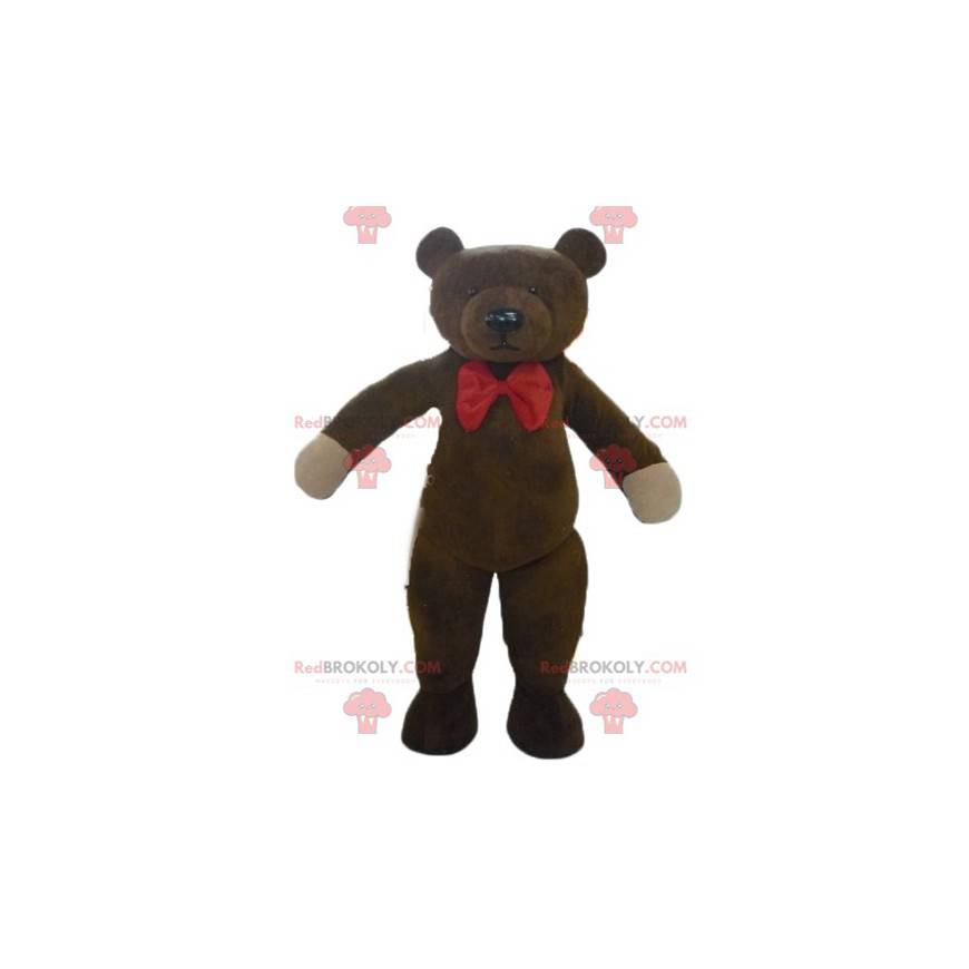 Mascotte de nounours marron avec un nœud de papillon rouge -