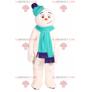 Mascotte de bonhomme des neiges souriant avec accessoires -