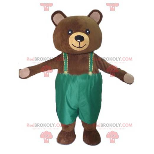 Mascotte grote bruine teddybeer met groene overall -