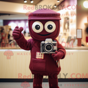 Maroon Camera maskot...