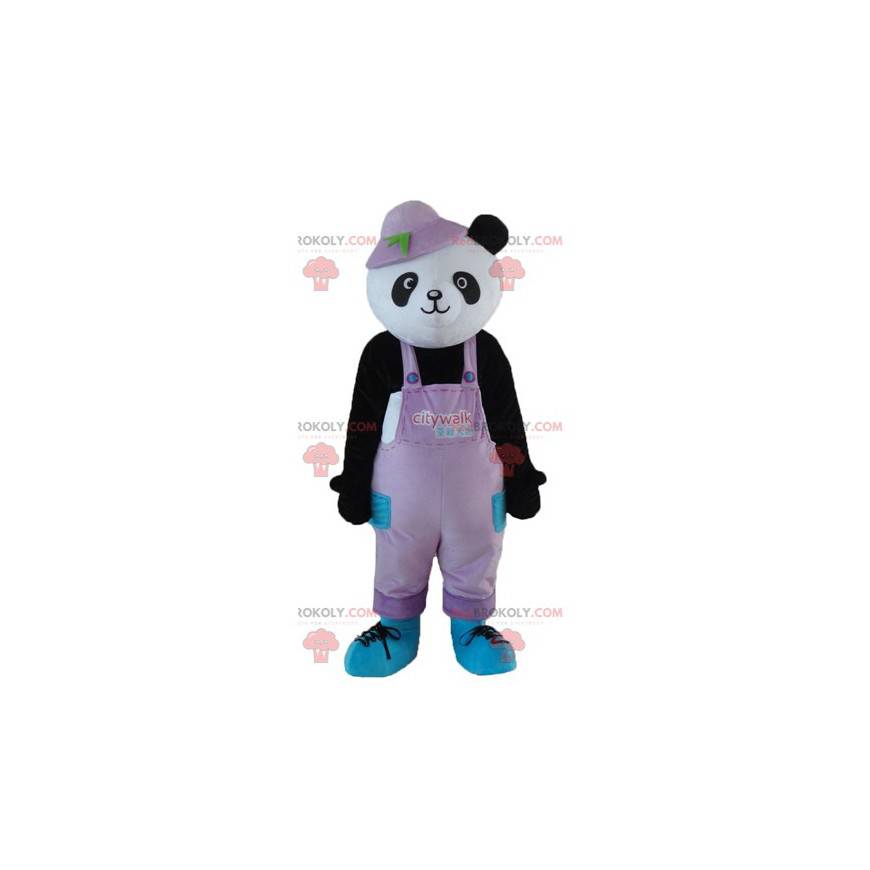 Czarno-biała maskotka panda w kombinezonie z kapeluszem -