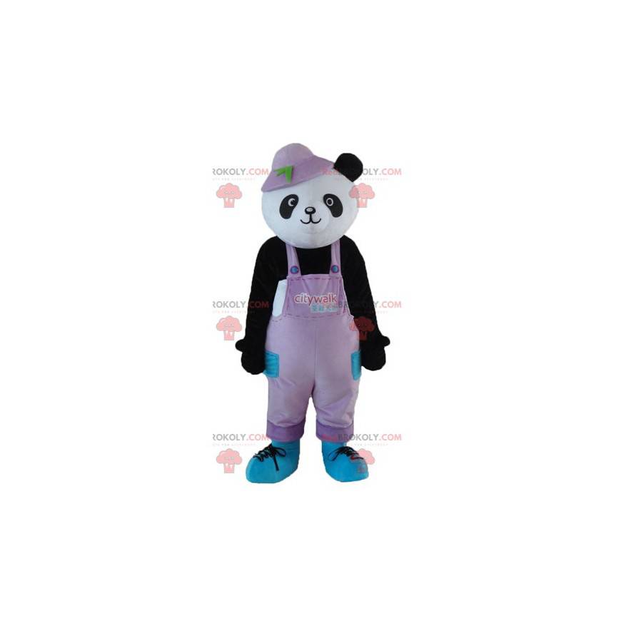 Mascotte de panda noir et blanc en salopette avec un chapeau -