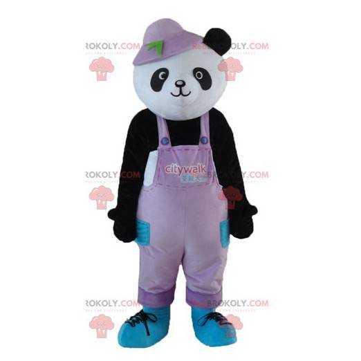 Mascotte de panda noir et blanc en salopette avec un chapeau -