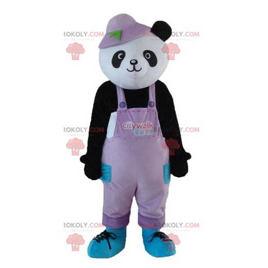 Zwart-witte panda-mascotte in overall met een hoed -