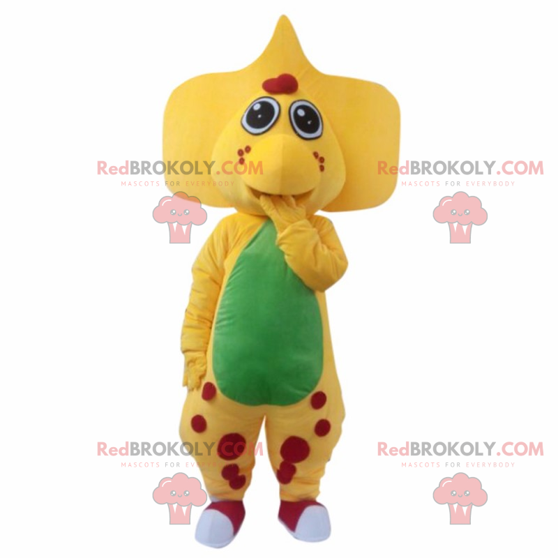 Mascote de dinossauro amarelo com orelhas grandes e manchas