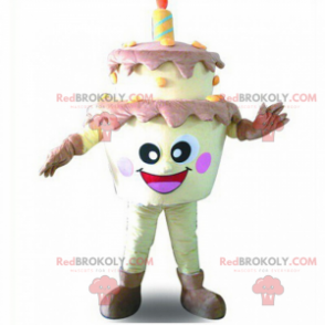 Mascota de pastel de cumpleaños con cara sonriente -