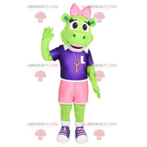 Mascotte de grenouille avec nœud rose et tenue sportive -