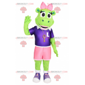 Froschmaskottchen mit rosa Schleife und sportlichem Outfit -
