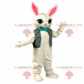 Mascota de conejo blanco en chaqueta floral y pajarita -