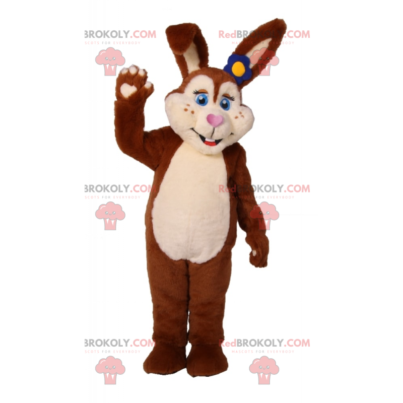 Brown rabbit mascot with blue eyes and blue flower -