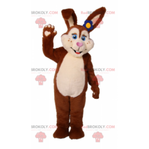 Brown rabbit mascot with blue eyes and blue flower -