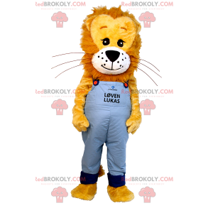 Lion maskot med hårete manke og blå kjeledress - Redbrokoly.com